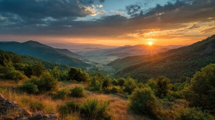 Sunset view over valley and mountains