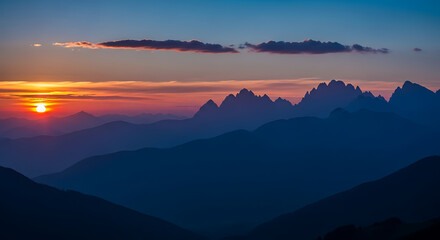 Fototapeta premium The silhouette of a distant ridge is the focal point, framed by a gorgeous sunset. 