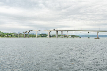 Gisund bridge, gisundbrua, cantilever road bridge in Norway connecting Finnsness with Senja Island,...