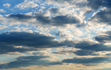 A beautiful blue sky with soft, white clouds, for an abstract background