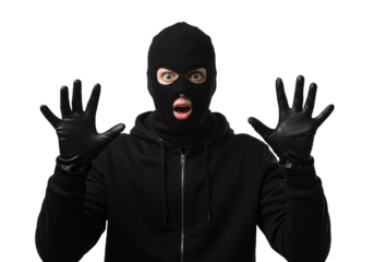 A person wearing a black ski mask and gloves with hands raised in surrender isolated on transparent background