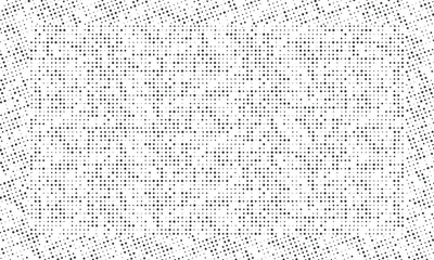 Abstract halftone background. Grunge halftone dots texture. Irregular dot pattern.