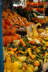 Orange and yellow pumpkins at the farmer's market. Harvest time in autumn.