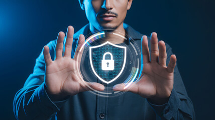 Man Holding Holographic Shield with Lock Icon, Cybersecurity Concept
