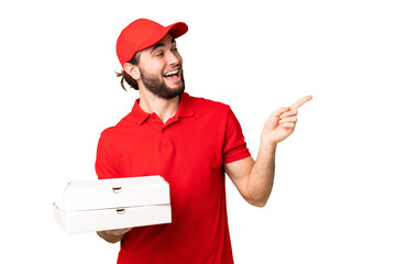 pizza delivery man with work uniform picking up pizza boxes over isolated chroma key background...