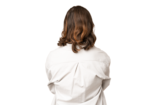 Young handsome man over isolated chroma key background in back position