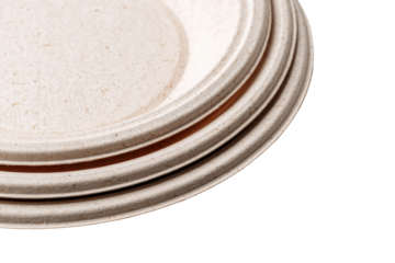 Two light beige, textured, disposable plates stacked