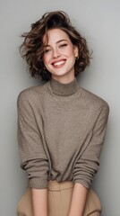 Studio Portrait of a young woman, soft natural lightning, casual outfit, light grey background, realistic photograph