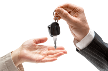 Hand of man in a formal suit handing over car keys to a woman's hand on isolated background. Concept of selling or renting a car