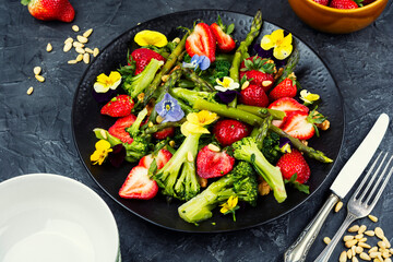 Vegetable salad with strawberries.