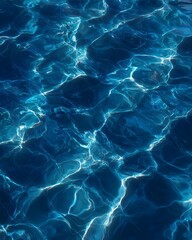 Aqua Majesty: Captivating abstract photo of water with a mesmerizing blend of brilliant blue hues that mimics the beauty of nature 