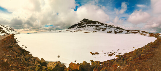 Panoramic view of a highland frozen lake. Nature park in Sauda municipality. Beautiful nature of Norway