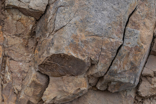 Hard buff sandstone, cobble conglomerate, and micaceous shale (Unnamed Marine Sedimentary Rocks). Garrapata Beach, California State Route 1, Monterey County.