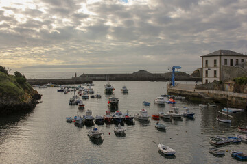 sunset light fills Tapia de Casariego port