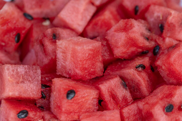 Freshly sliced watermelon on a plate, ready to eat