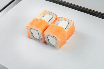 Fresh sushi with sauce and powder