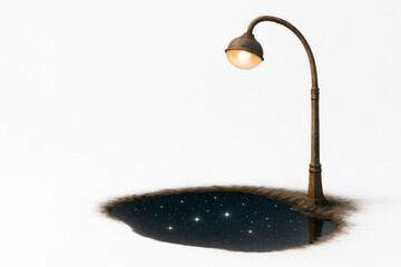 Lantern over a starry mirror lake in the ground. Space for text.