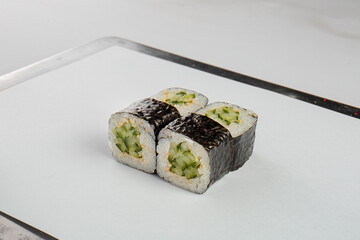 Fresh sushi with sauce and powder