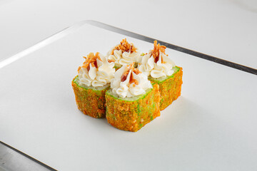 Fresh sushi with sauce and powder