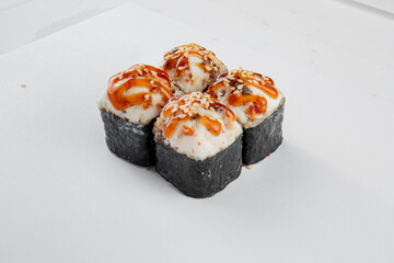 Fresh sushi with sauce and powder
