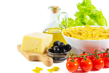 Farfalle pasta, cheese, olive oil and vegetables. Ingredients of Italian cuisine.