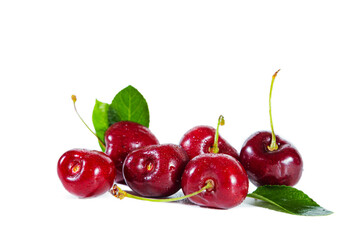 Ripe juicy cherry with  leaves isolated on white background.