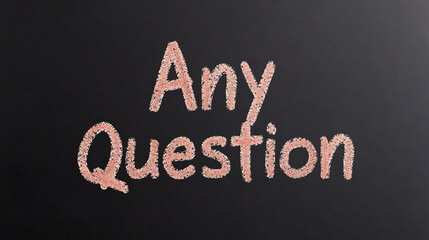 Chalkboard message asking if there are any questions. Written in a clear, easily readable font on a dark chalkboard surface.