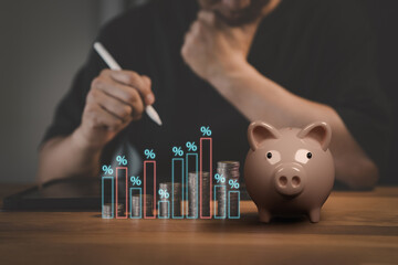 Piggy bank with stack coins and bar chart displaying interest percentages. Concept of savings growth, investment planning, financial, wealth accumulation, money management for personal finance goals.