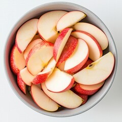 Studio Shot: Sliced Red Apples in Bowl, Perfect for Food Blogs, Recipes, and Health Websites