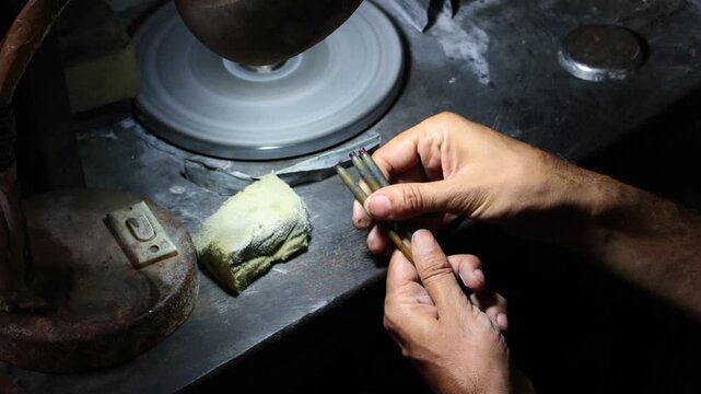 Gem Cutter Polishing Gemstones in Jaipur, India