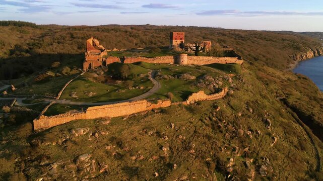 Drone panning around medieval castle ruin of Hammershus in Denmark
