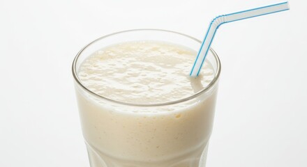 Creamy Vanilla Milkshake in Glass with Blue Straw, Refreshing Drink.