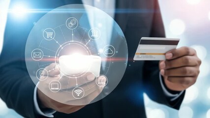 A businessman holds a credit card and a smartphone, surrounded by a network of digital service icons, symbolizing online transactions and connectivity - Powered by Adobe