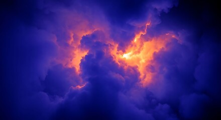 Fototapeta premium Dramatic celestial vista showcasing vibrant orange clouds amidst a dark blue expanse