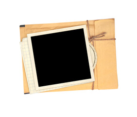 Top view of blank vintage aged letter paper envelope and blank photo frame. Retro photo on with envelope with a rope is depicted.  Nostalgic scrapbooking style. Isolated on white background