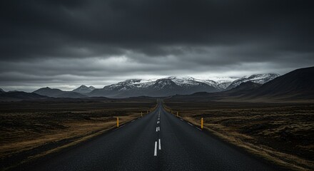 Naklejka premium Empty road leading to mountain range