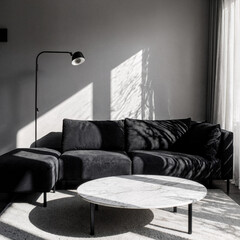 Monochrome modern living room with black modular sofa, marble coffee table, and autumn sunlight reflections