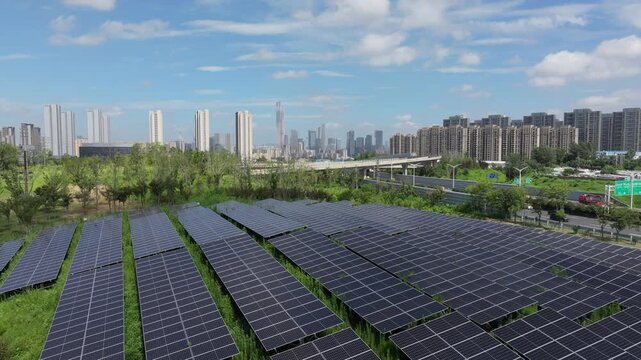 Green city, energy city, solar panels, and distant city skyline