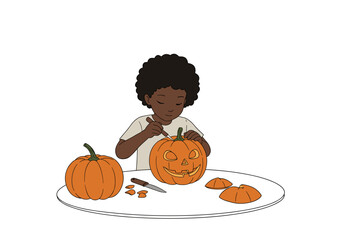 Young black child carving pumpkin for Halloween decoration  