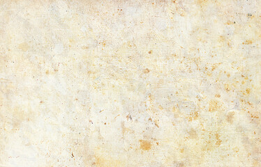 Aged grunge paper texture with scattered rust-like stains