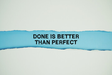 Done Is Better Than Perfect text on blue with white paper torn ripped of horizontal