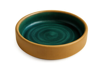 Ceramic bowl with vivid green glazing inside, mustard yellow exterior, minimalist design against transparent backdrop