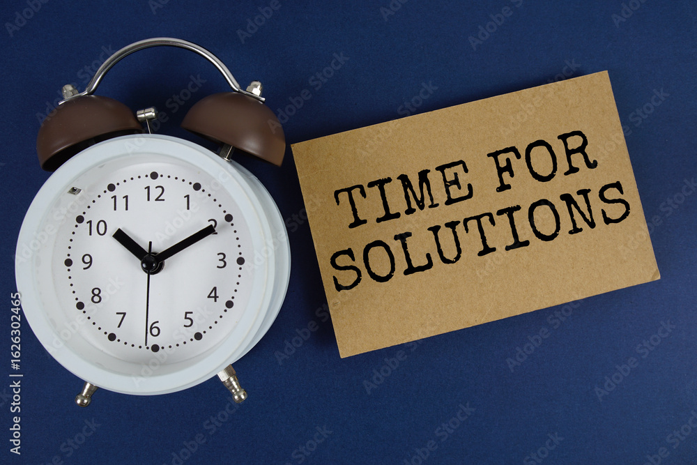 Poster time for solutions text with alarm clock on blue background