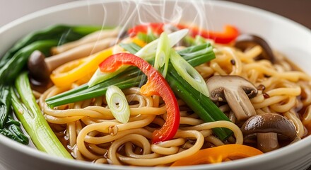 Steaming bowl of noodle soup featuring fresh vegetables and savory mushrooms.