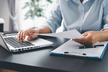 Business person with contract law and paper work for business finance, loan application form, contract real estate and insurance concept. signing contract, working on desk, business document
