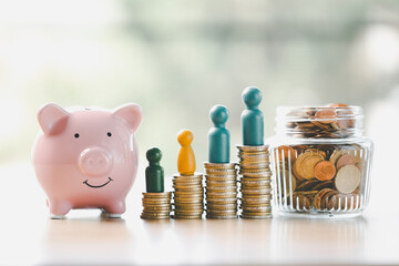 Money box filled with coins, saving cash, banking wisely, making sound investments can build...