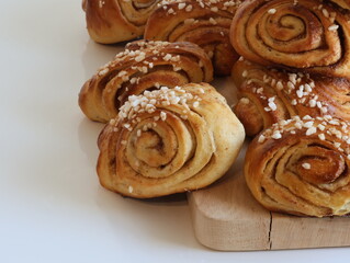Cinnamon rolls on wooden board