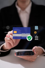 Person using credit card in online digital payment mobile banking money transfer laptop smartphone transaction internet with password security information encryption identity verification protection