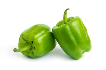 Close up photo of fresh organic peppers isolated on white background