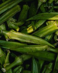 Fresh vegetables at small local urban market. Organic produce on sale at outdoor farmer market. Selling fresh crops and veggies harvest. European urban setting. Close up. Part of the series